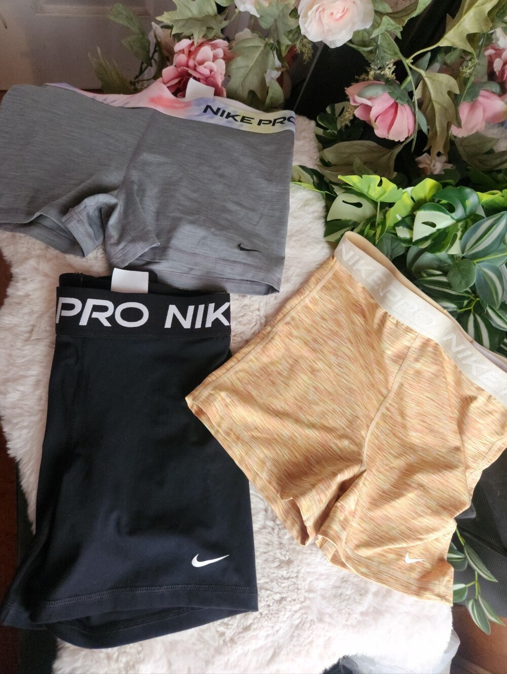 Nike Women's Athletic Shorts Trio - Gray, Black, Yellow, 2 Short M and 1 Large.